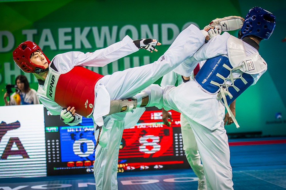 Tae-Hun Kim (KOR) vs. Armin Hadipour Seighalani (IRI) competes during the 2017 World Taekwondo Championships on June 25